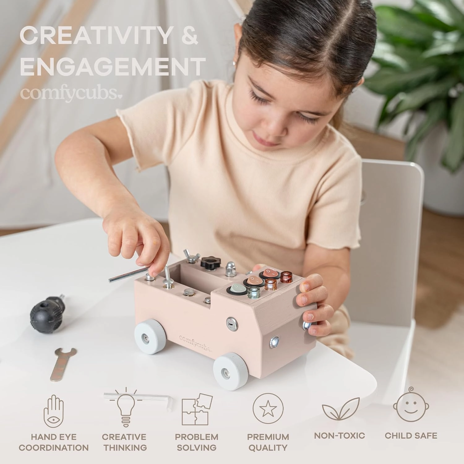 Comfy Cubs Busy Board Toy Truck Set - Fun & Noise-Free, Pine Wood Activity Board for Toddlers with LED Light Switch - Designed in The US, Focused & Engaging Montessori Play for Kids 3  (Blush)