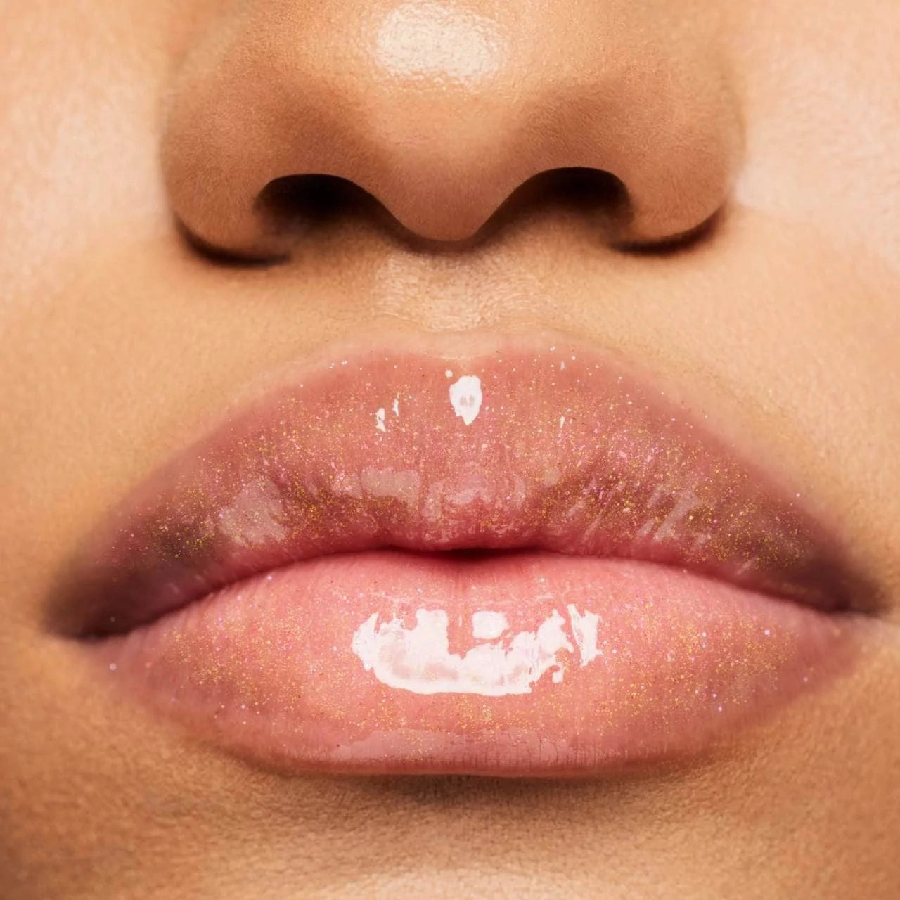 Fenty Beauty X Arcane – Gloss Bomb Universal Lip Luminizer