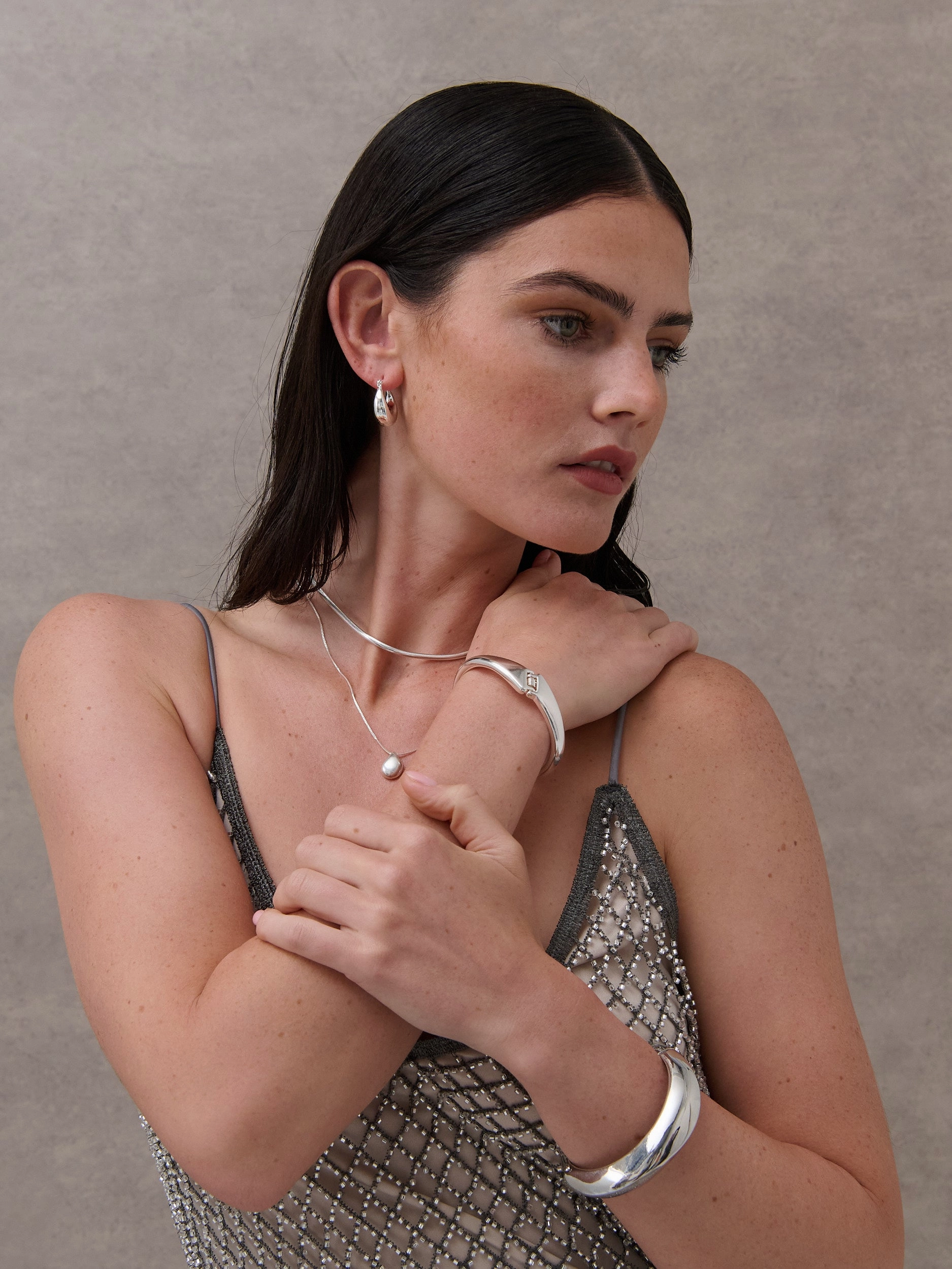 Interlock Twist Sterling Silver Plated Bangle