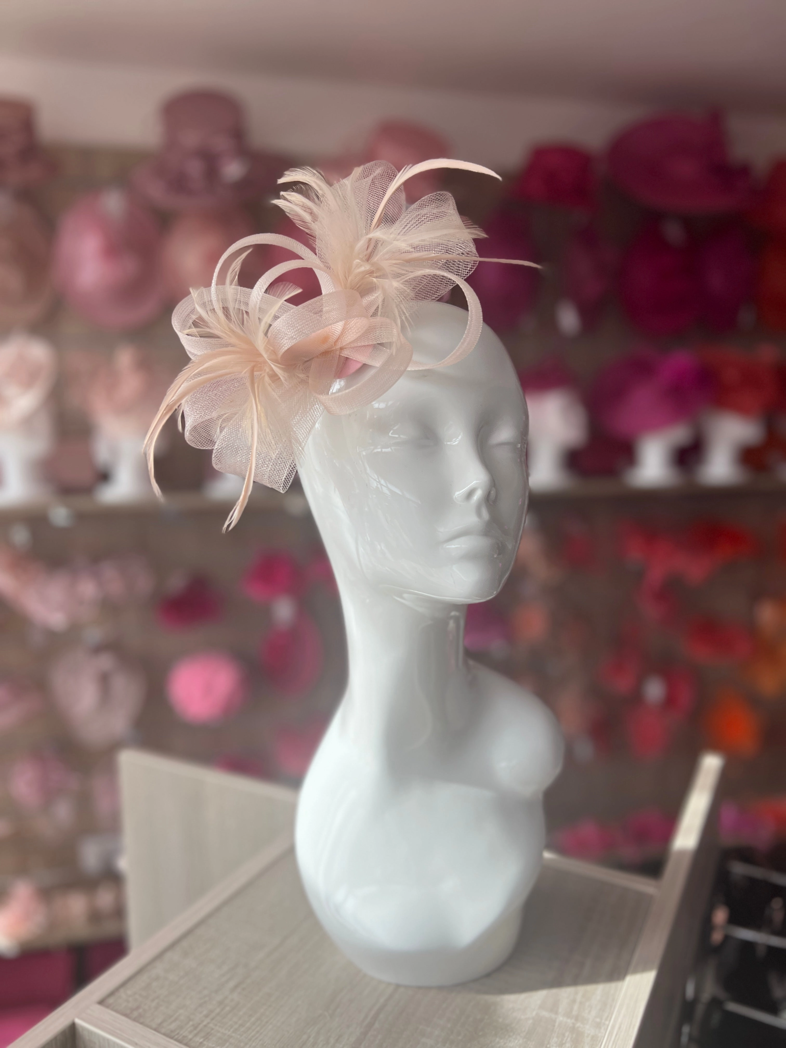 Nude Pink Loop Bow Fascinator With Feathers